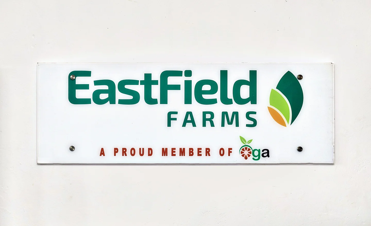 The Eastfield Farms sign on an office wall: a proud member of OGA.